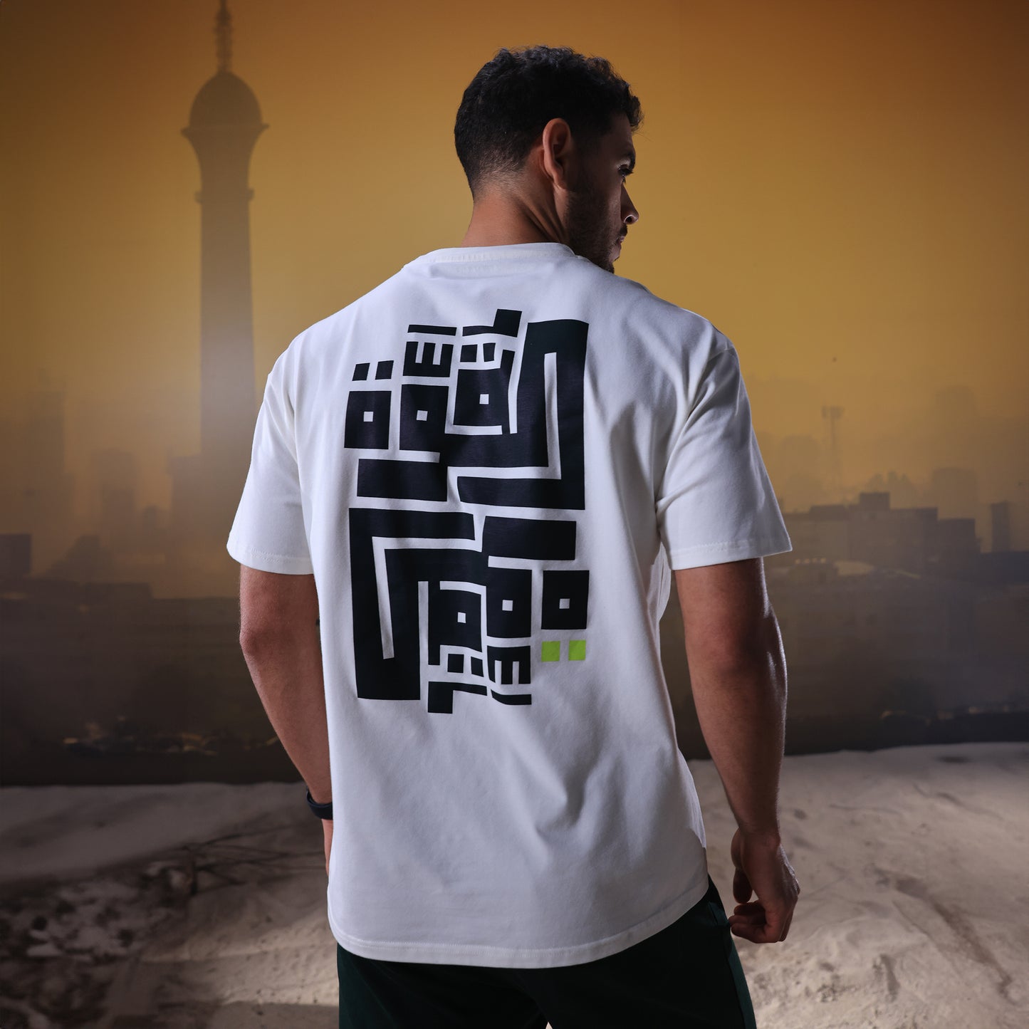 تيشيرت سكوات وولف x إبراهيم زكي فضفاض - أبيض