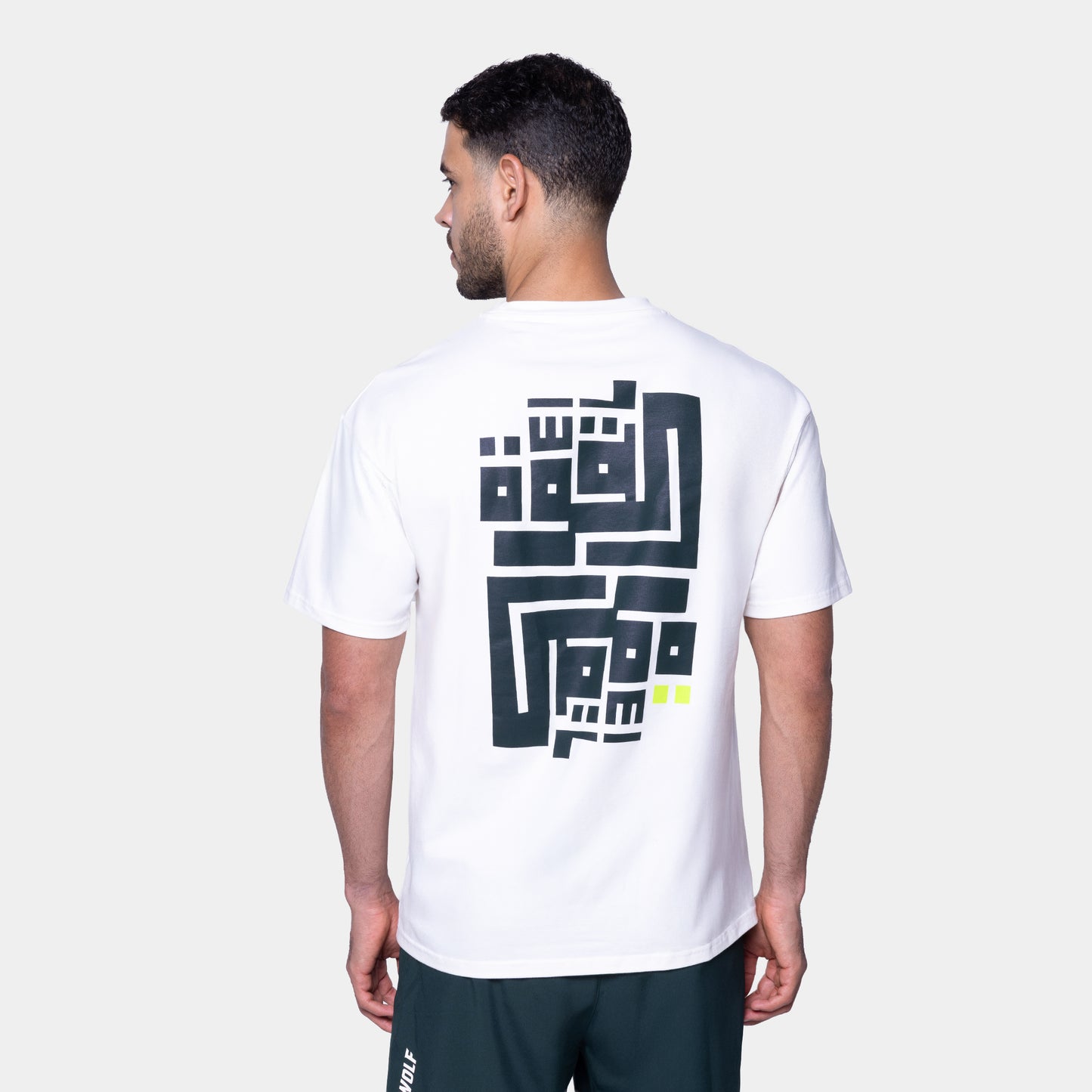 تيشيرت سكوات وولف x إبراهيم زكي فضفاض - أبيض