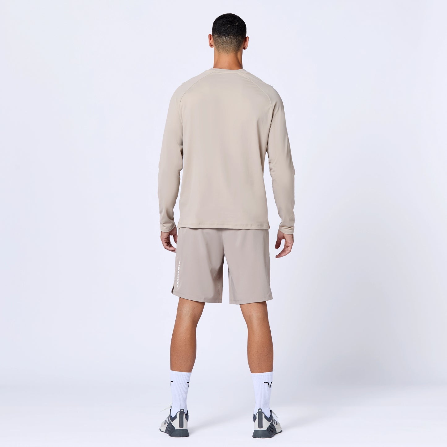  تيشرت ايسينشال اكتيف بأكمام طويلة - ترابي