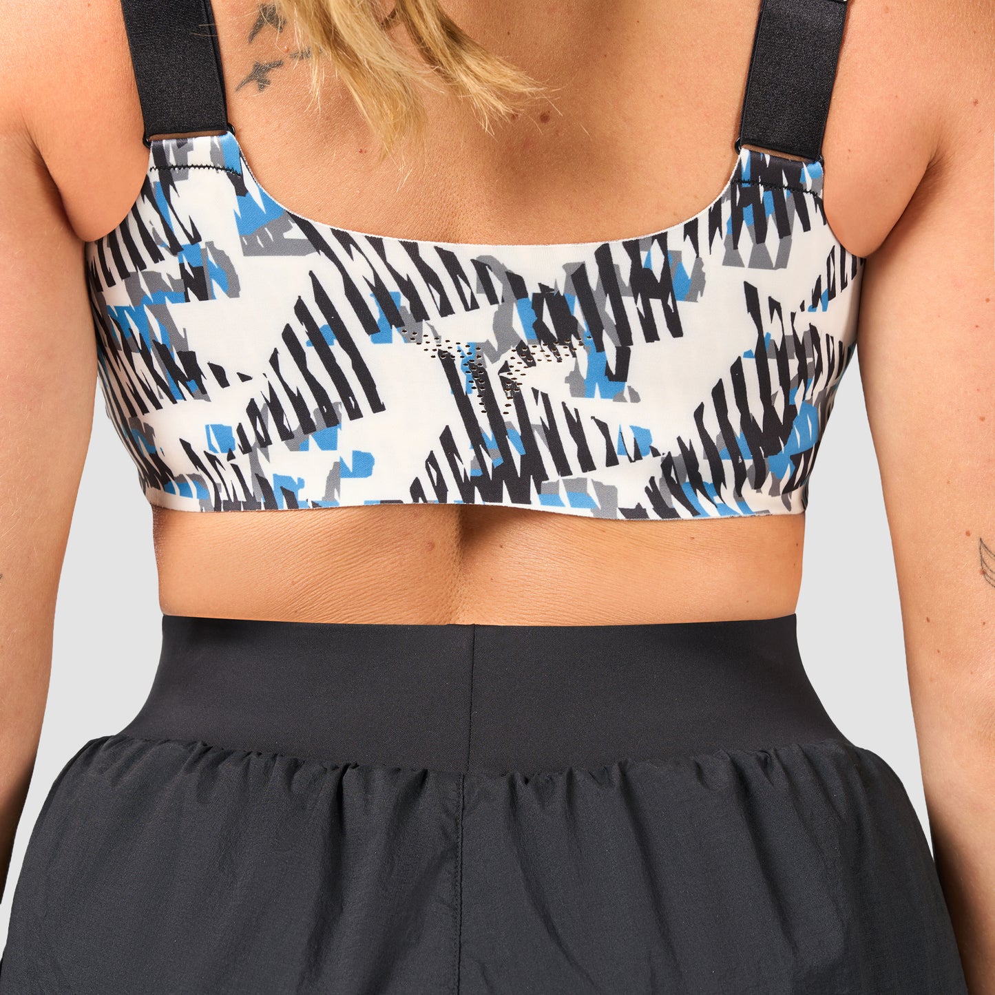 حمالة صدر أكت دراي ® بسحاب أمامي - طبعة ألوان نيون