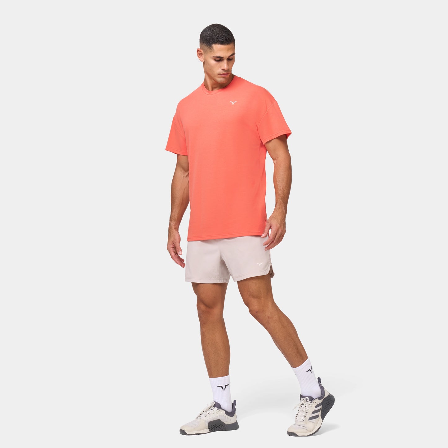 ايسينشال تيشيرت فضفاض - مرجاني 