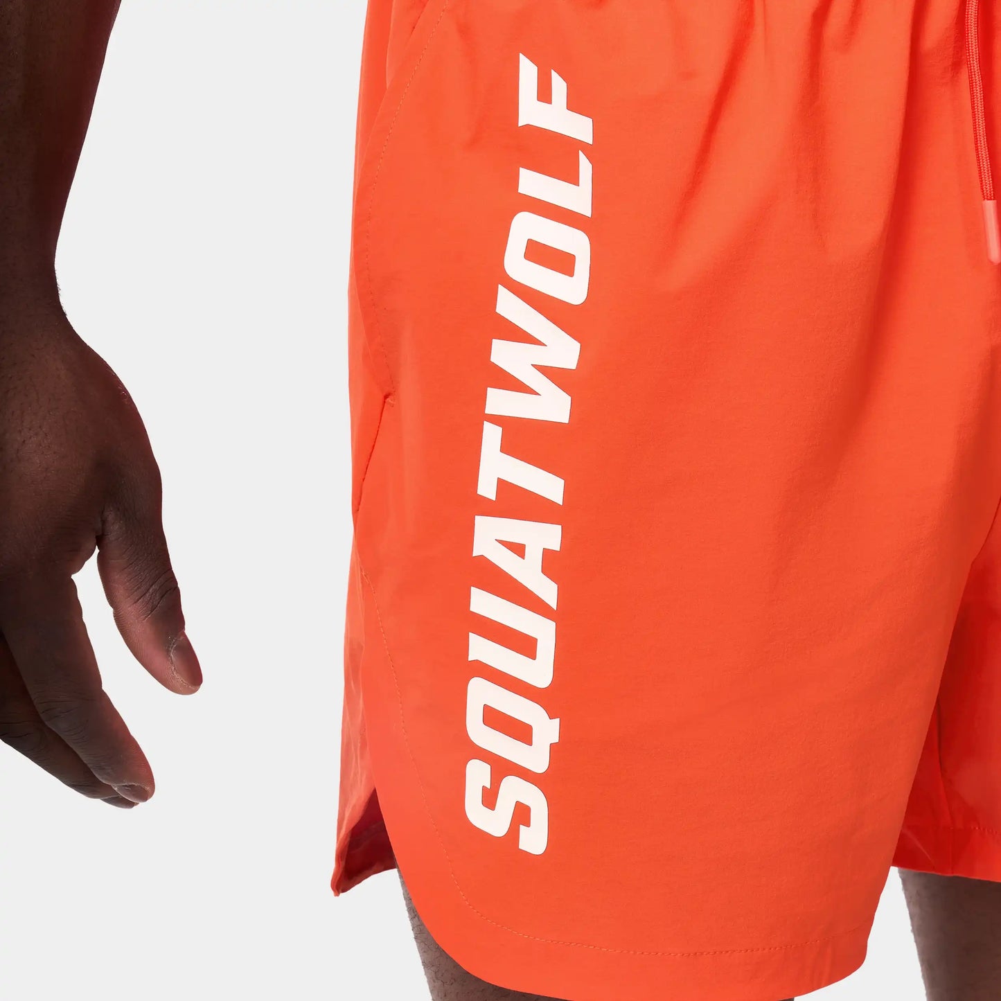 5” Gym-to-Swim Shorts - Orange.Com