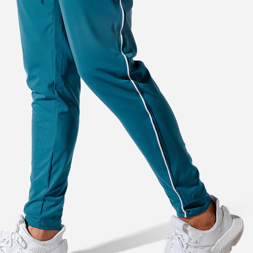 squatwolf-pants-for-women-evolve-track-joggers-teal-gym-workout-clothes