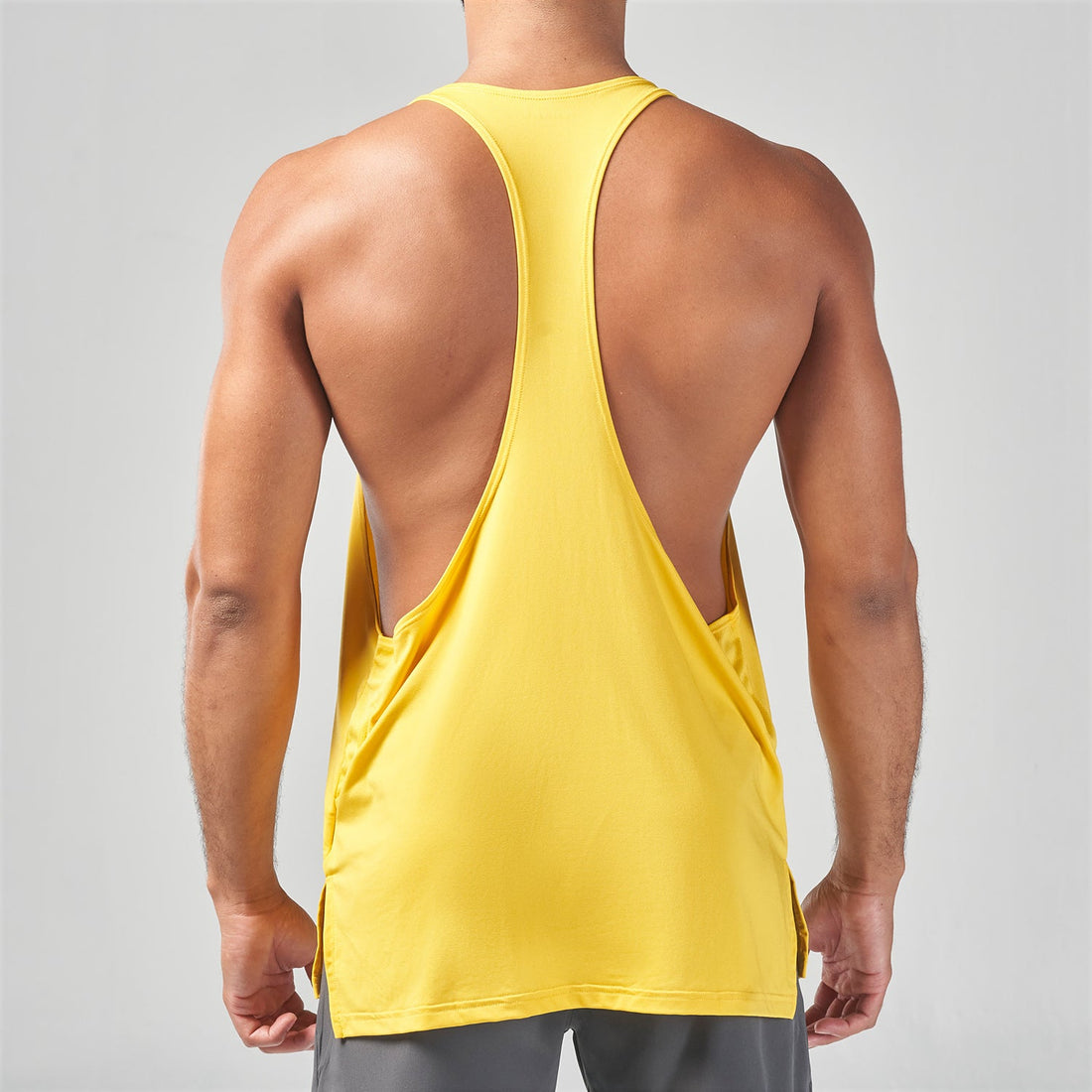 squatwolf-gym-wear-essential-gym-stringer-yellow-stringer-vests-for-men