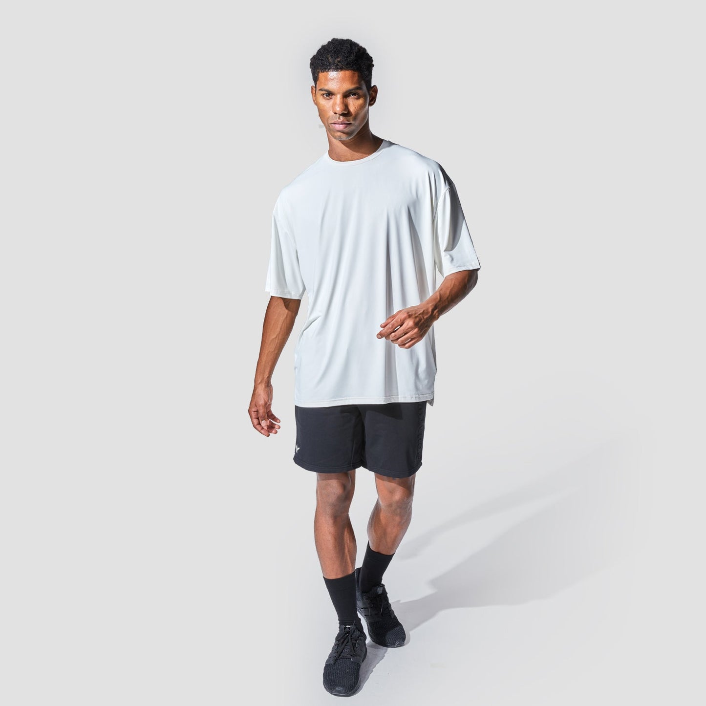 squatwolf-gym-wear-graphic-wordmark-oversized-tee-white-workout-shirts-for-men